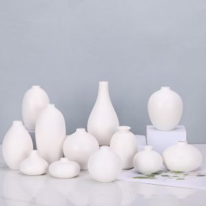 61IeHImYn5L._AC_SL1500 Goodsright Decor Bud Vases Set of 12 - White Ceramic Bud Vases in Bulk Dining Table Centerpieces, Cute Mini Small Flower Vase for Pampas Grass&Single Flower Decor, Ideal Wedding Window Sill Aesthetic Desk Decor