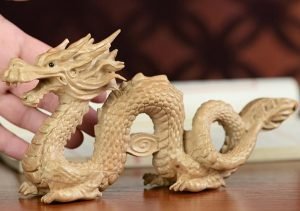 61KlKmSqOiL._AC_SL1500 Goodsright Decor Hand Carved Feng Shui Chinese Loong, Good Luck Statue Chinese Figurine,Animal Wealth Gold Hand Success Feng Shui Dragon Home Decoration,21x10cm, 1PC